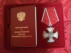 Александр Олдак вручил ордена Мужества вдовам погибших сотрудников Александр Олдак вручил ордена Мужества вдовам погибших сотрудников